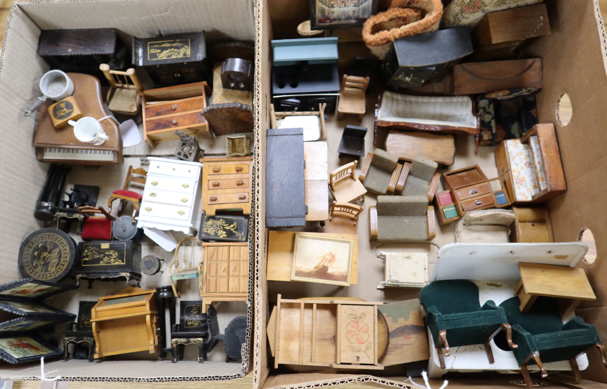 A collection of dolls and dolls house furniture displayed in room settings in a pine cupboard, width 84cm, depth 36cm, height 132cm